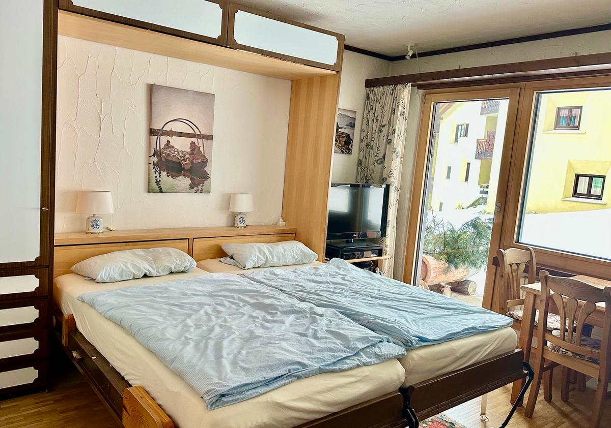 Schlafbereich mit Doppelbett